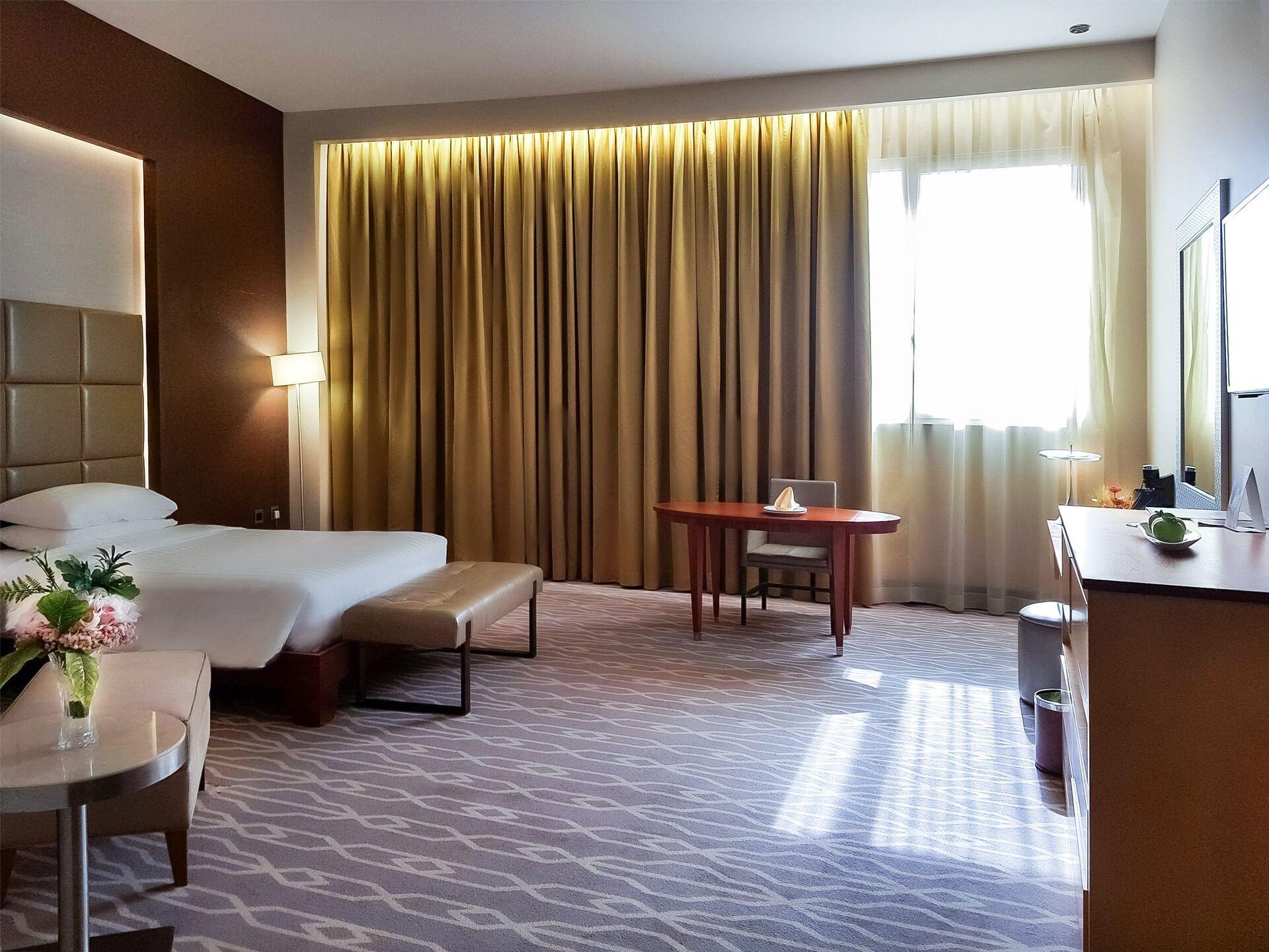 Millennium Hail Hotel Eksteriør bilde A room at the hotel
