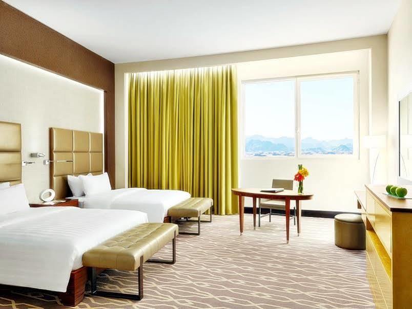 Millennium Hail Hotel Eksteriør bilde A guest room at the MGM Grand
