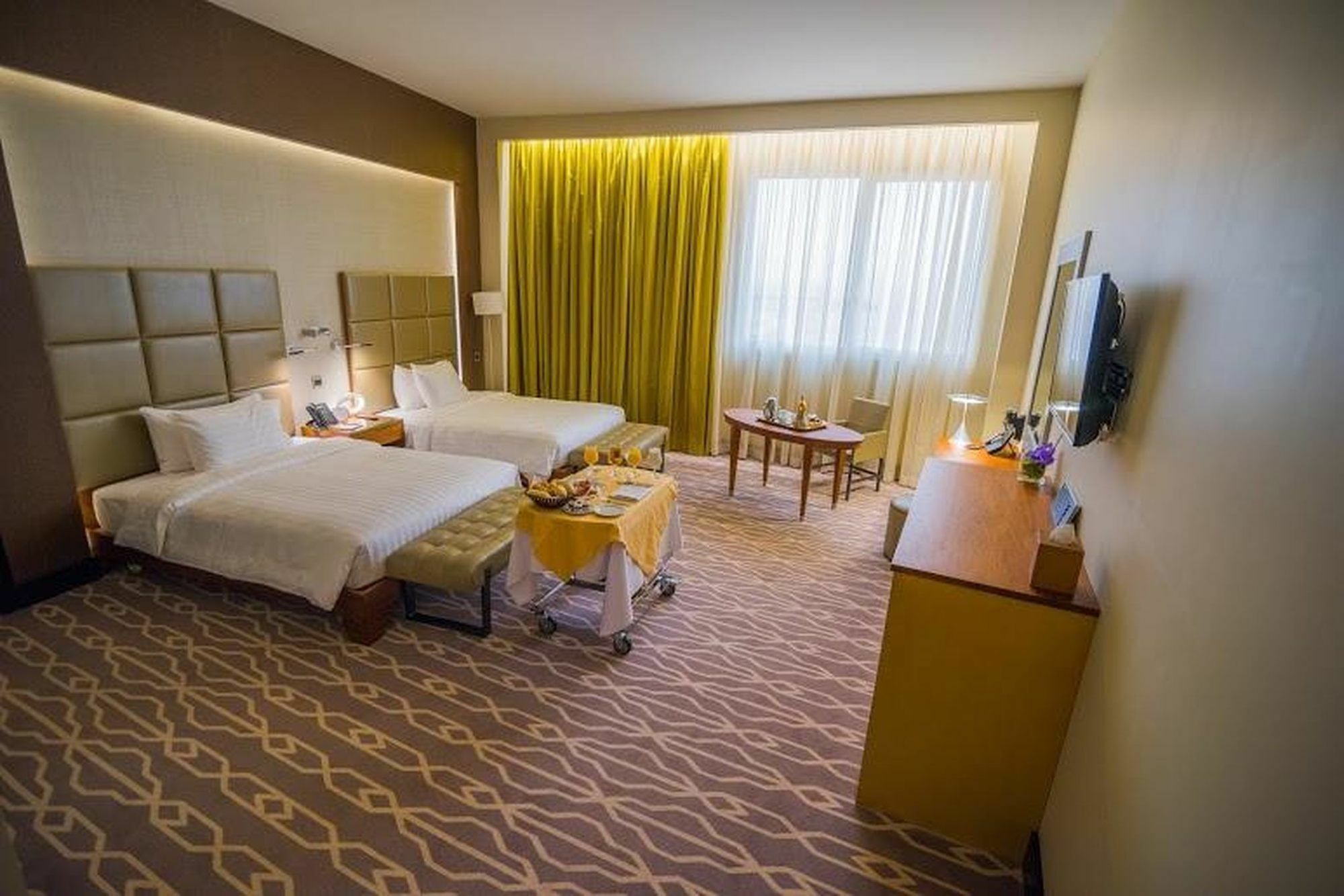 Millennium Hail Hotel Eksteriør bilde A room at the hotel